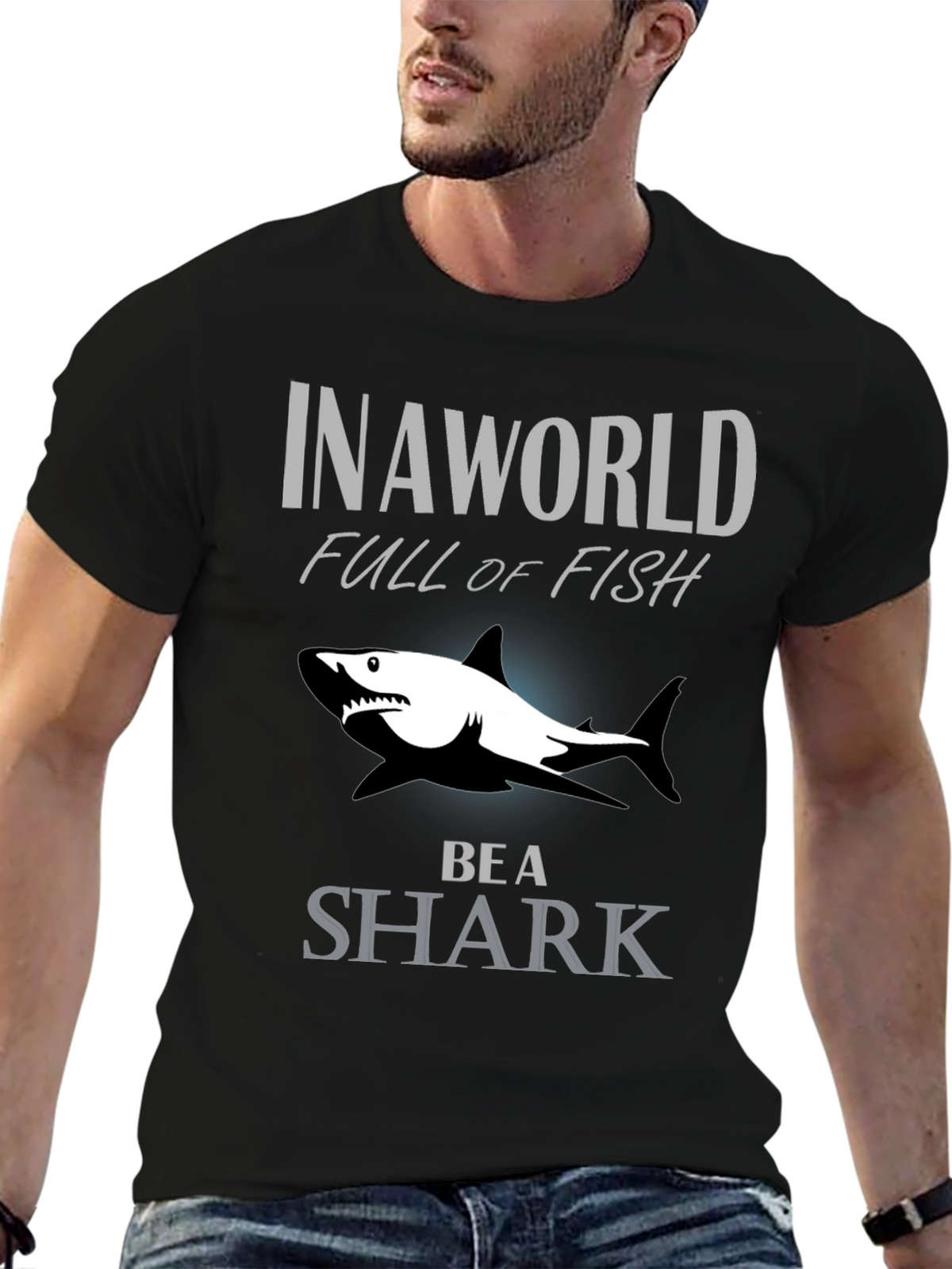 In A World Full Of Fish Be A Shark Graphic Tee